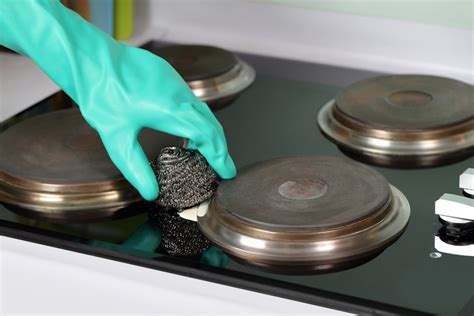 gas stove plate cleaning